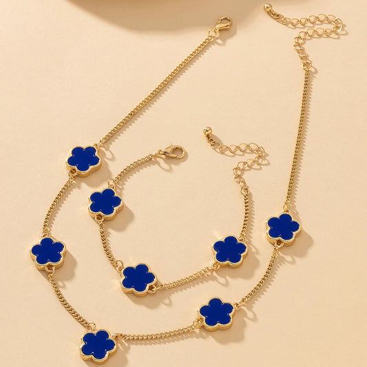 Gold-plated necklace and bracelet set with blue clover flower charms