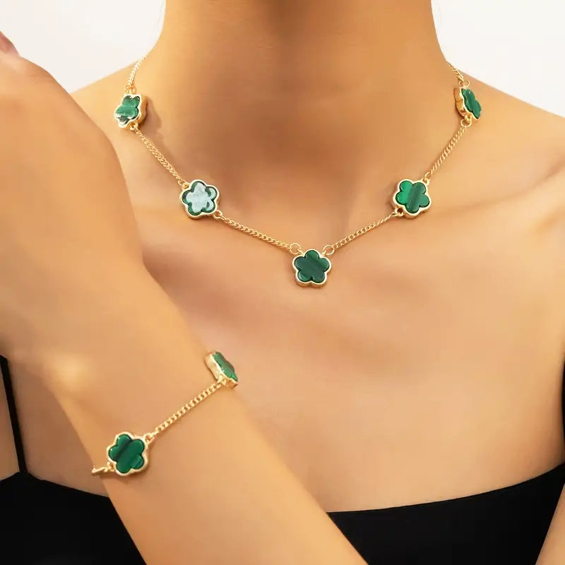 Gold-plated necklace and bracelet set with green clover flower charms