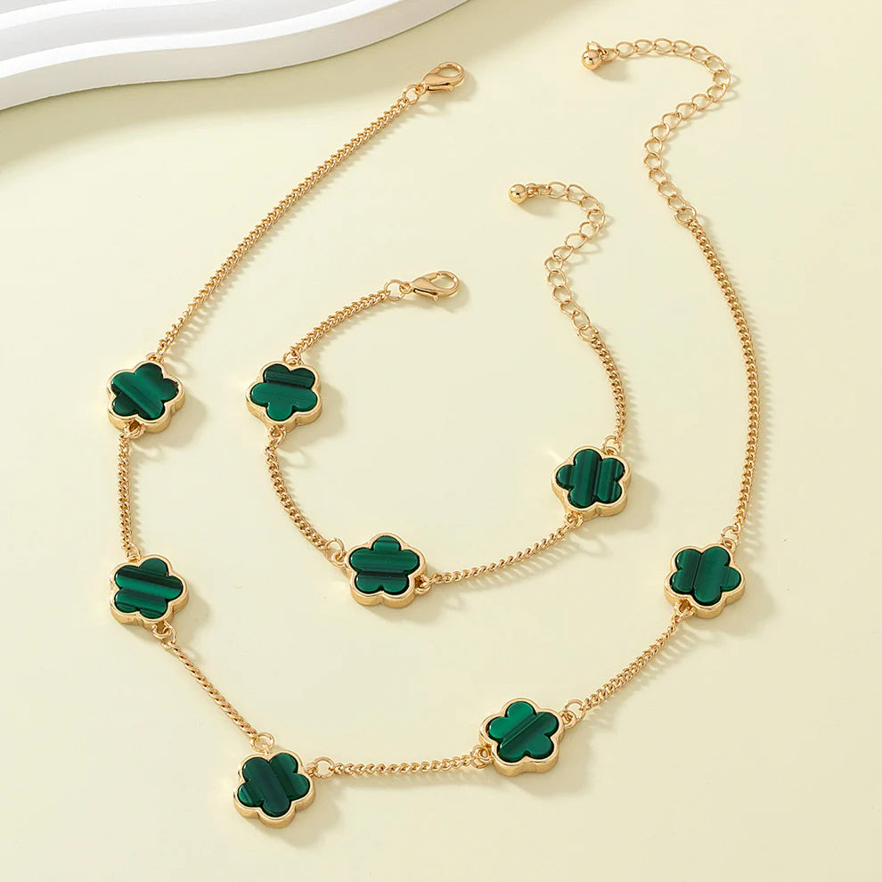 Gold-plated necklace and bracelet set with green clover flower charms